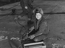 A "Wendy the Welder" at the Kaiser Richmond Shipyards contributing to the war effort.